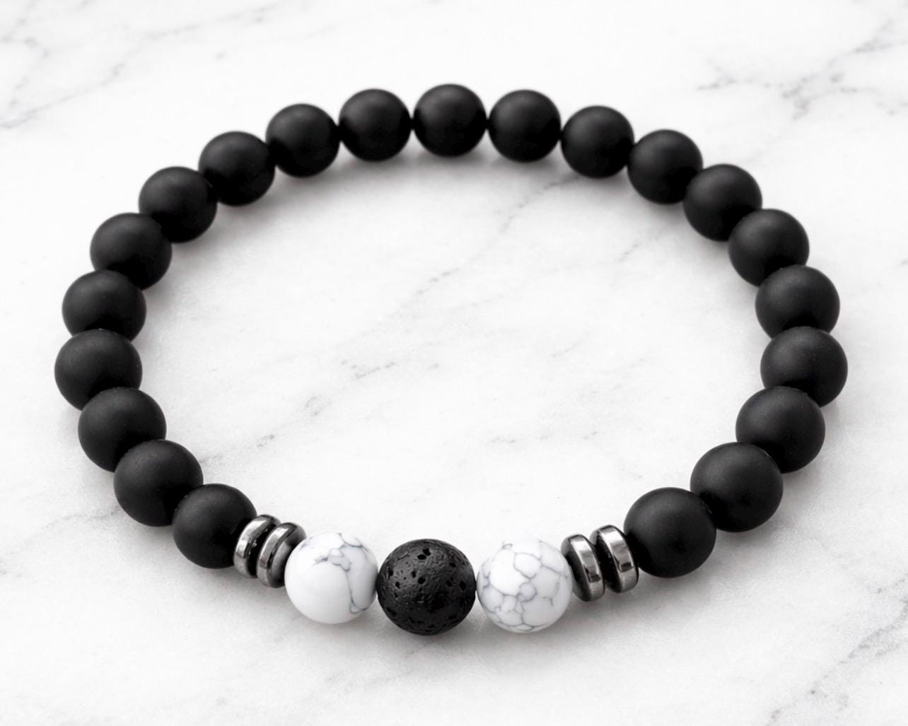 Black beads with White  and silver accents