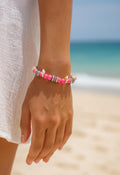 Pink Beaded Beach Bracelet with Conch shells and silver/black spacers