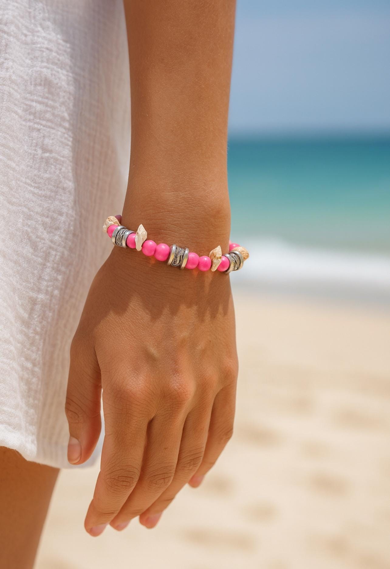 Pink Beaded Beach Bracelet with Conch shells and silver/black spacers