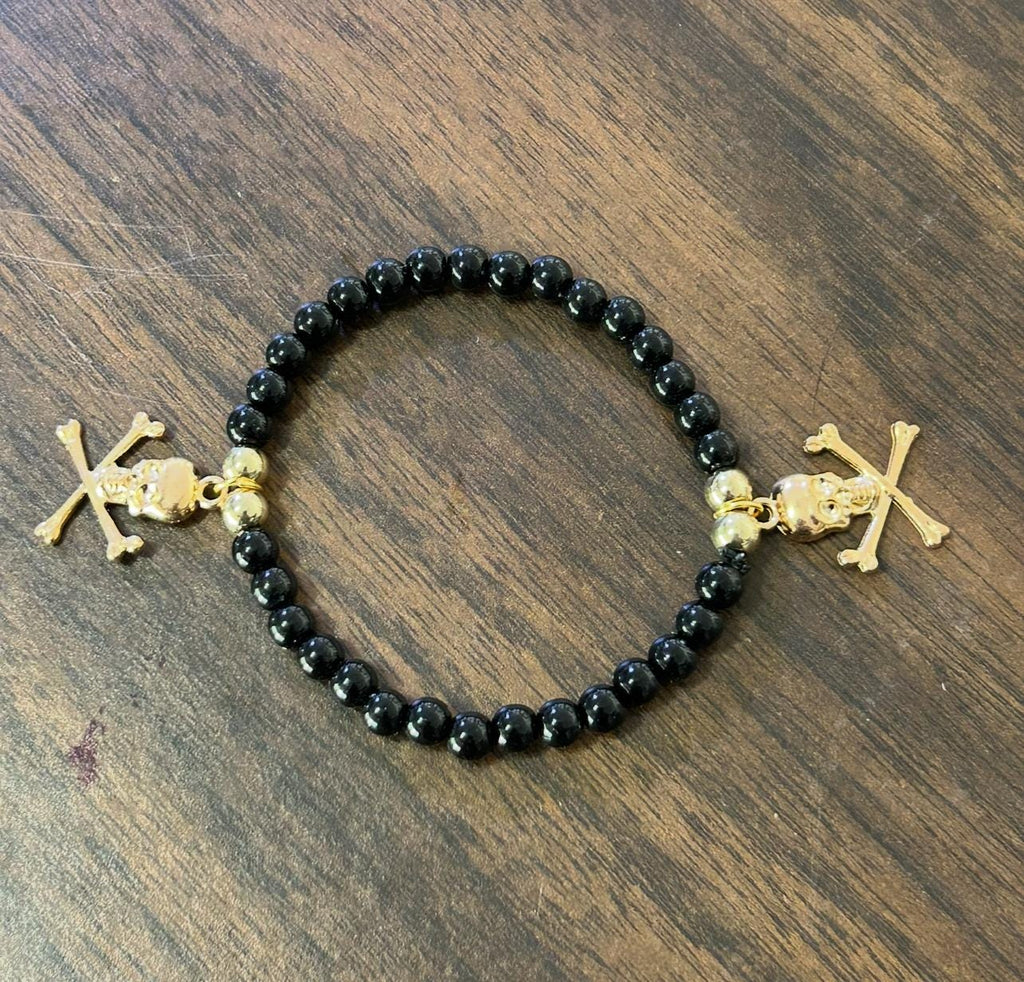 Gold Skull & Crossbones Bracelet: Black Onyx Beads