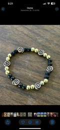 Black and Gold Beaded Bracelet with Copper Swirls