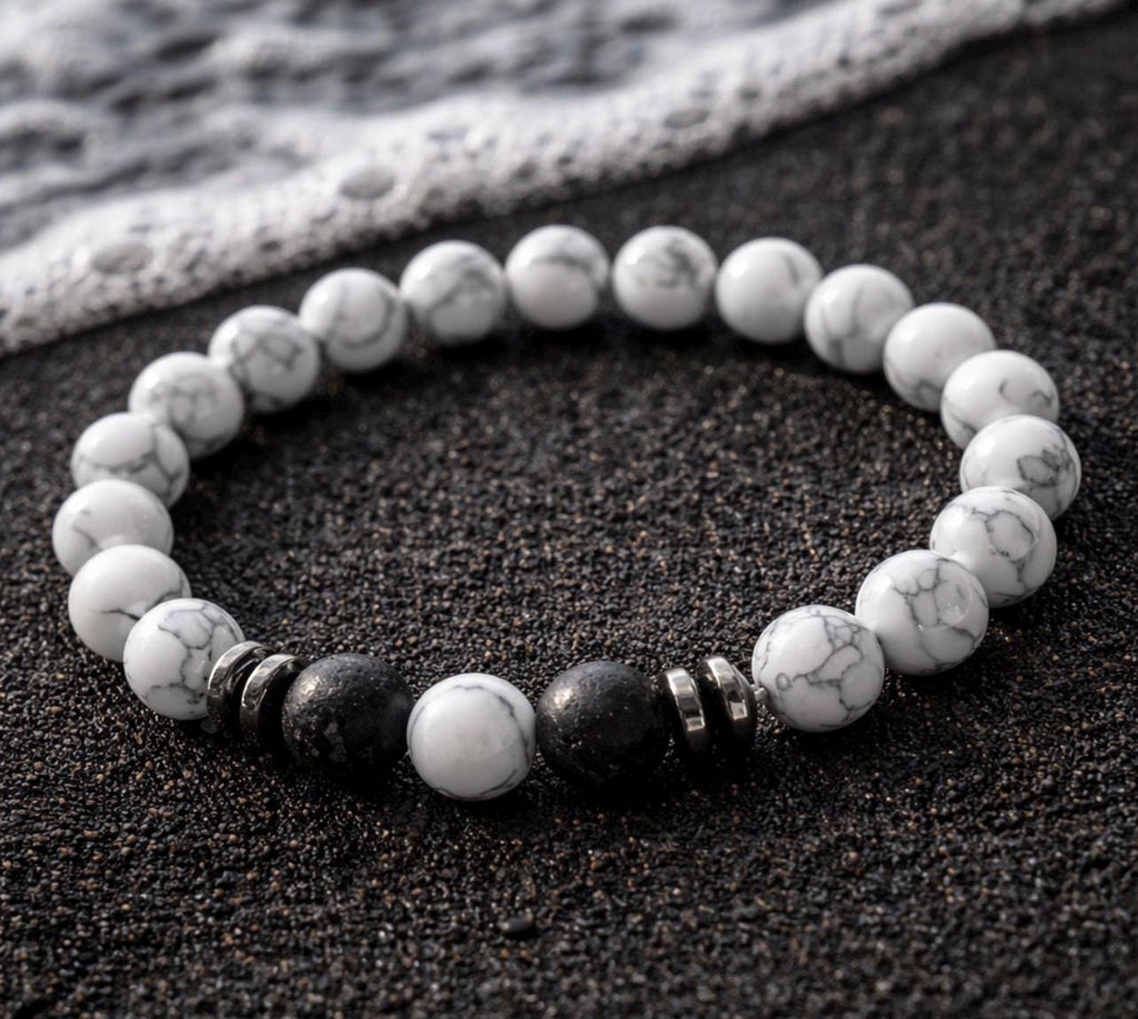 White  beads with Black and silver accents