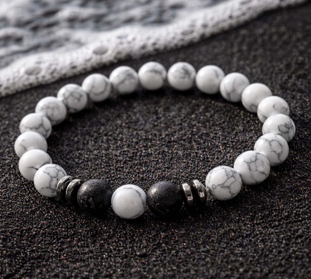 White  beads with Black and silver accents