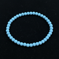 Desert Sky solid turquoise bead bracelet on black felt