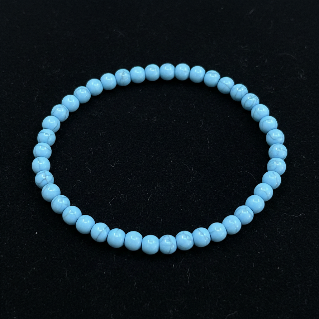 Desert Sky solid turquoise bead bracelet on black felt